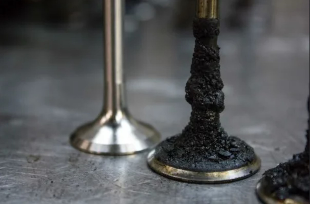 Деградация клапана из-за нагара Нагар на клапанах